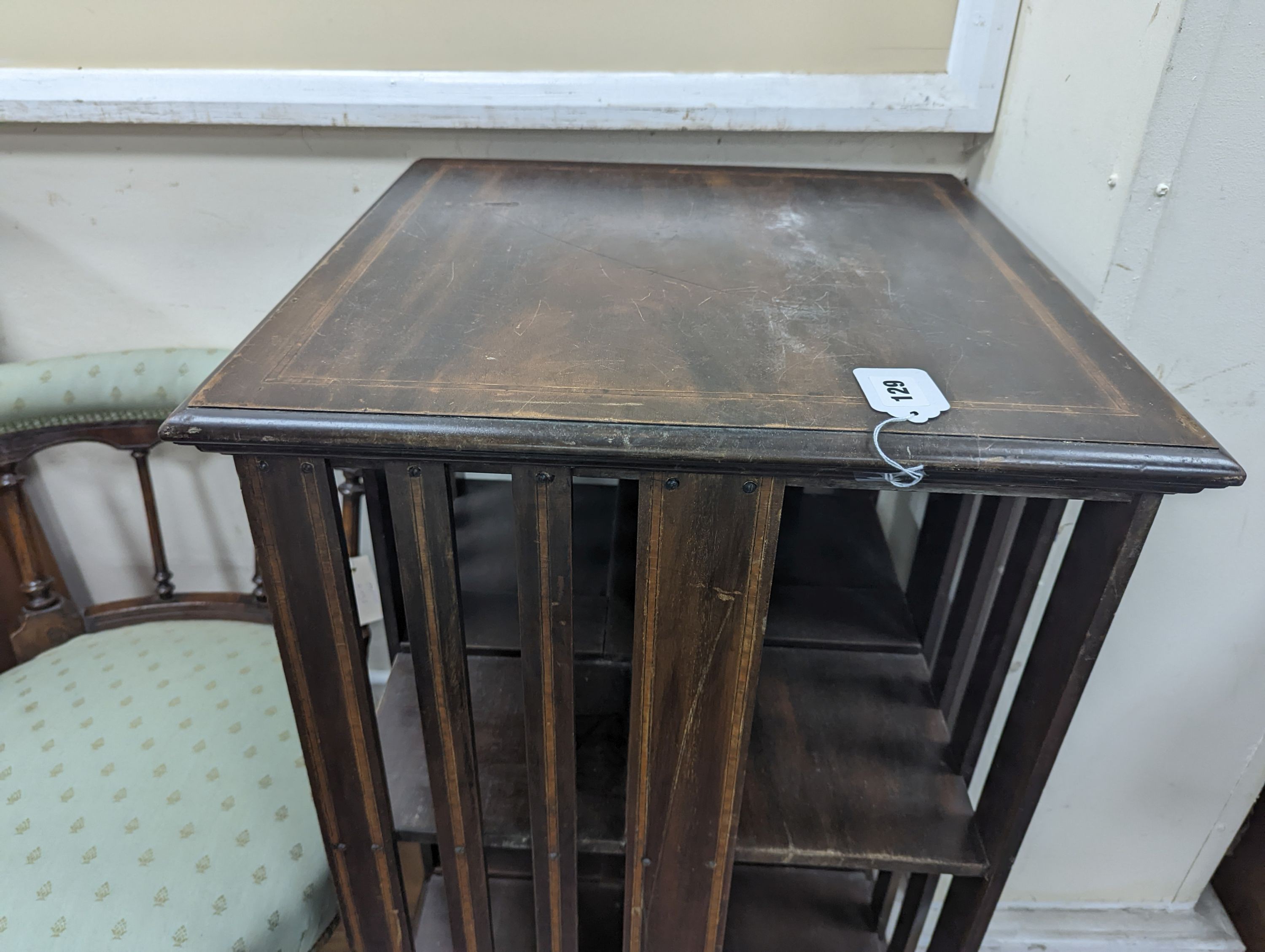 An Edwardian mahogany revolving bookcase, width 49cm, depth 49cm, height 81cm